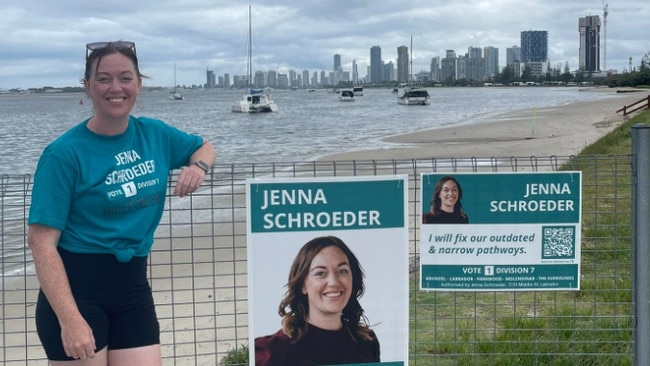 Jenna Schroeder, Division 7 candidate in the Gold Coast City Council 2024 election, fixing her corflutes after vandals targeted her campaign.