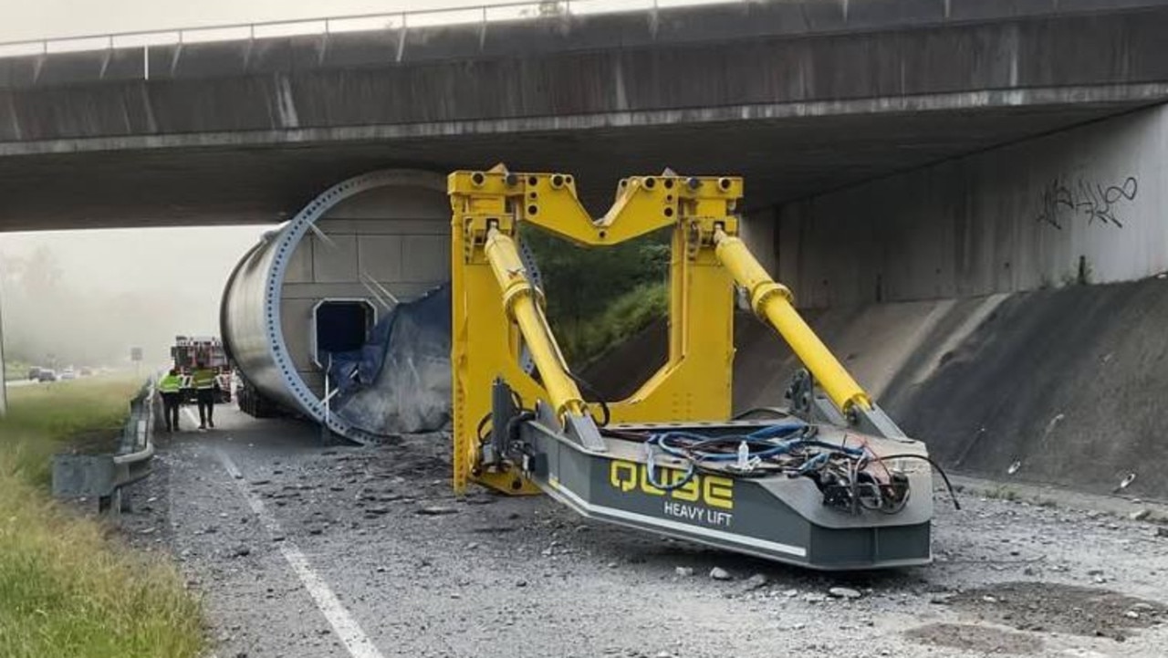 A wind turbine remains wedged under the Mt Crosby Bridge on the Warrego Highway near Ipswich. Picture: Facebook