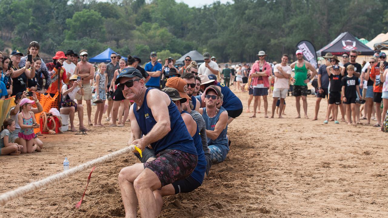 The O’Brien team fighting to win their tug of war at the Darwin Beer Can Regatta at Mindil Beach, 2023. Picture: Pema Tamang Pakhrin