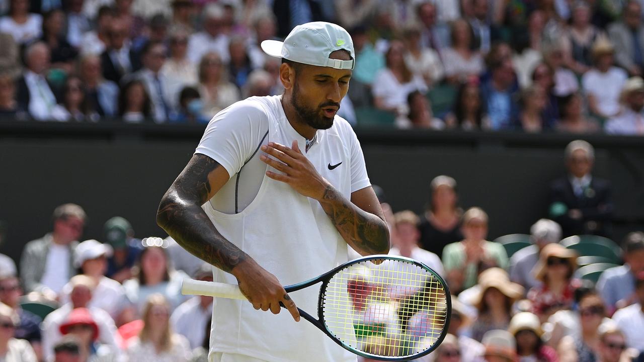 Nick Kyrgios holds his shoulder against Brandon Nakashima during his five-set win during the fourth round of Wimbledon. Photo: Getty Images