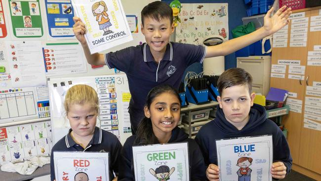 Glen Osmond Primary school students Livvvy (7), Ayra (9), Yuang (11) and Claire (11) are taking part in a landmark trial teaching kids regulation skills like how to set goals, and how to not have an emotional reaction when struggling. Picture: Kelly Barnes