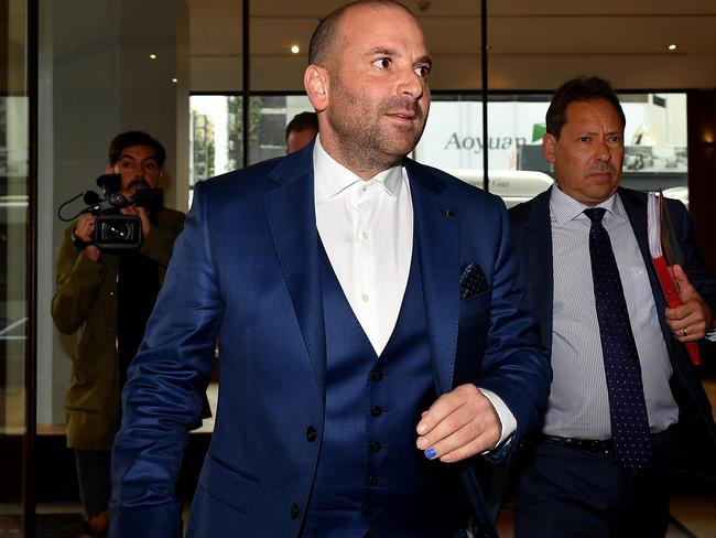 George Calombaris arrives at the Downing Centre court in Sydney today. Picture: AAP Image/Joel Carrett