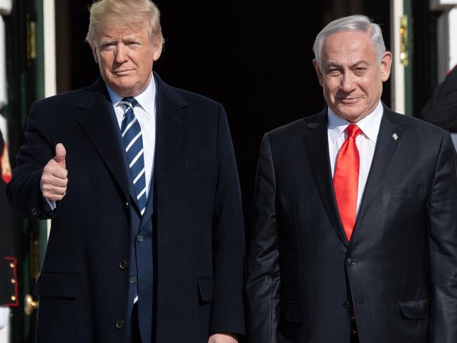 US President Donald Trump greets Israeli Prime Minister Benjamin Netanyahu. Picture: AFP