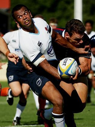 Kurtley Beale looks to offload. Picture: Colleen Petch.