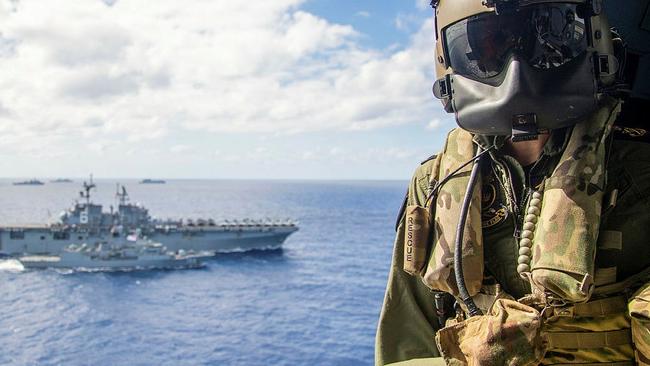 Various nations participating in a military training exercise off Queensland.