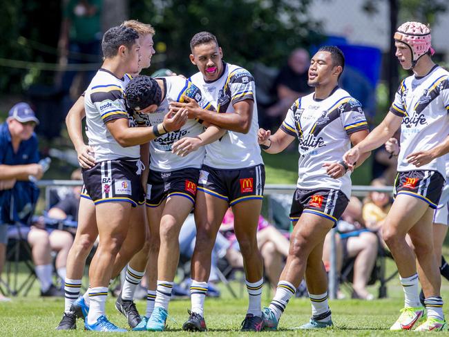 Auswide Bank Mal Meninga Cup, Magpies vs WM Seagulls at Davies Park, Brisbane.  WM Seagulls players celebrate with  #7 Stanley Huen .  Picture: Jerad Williams