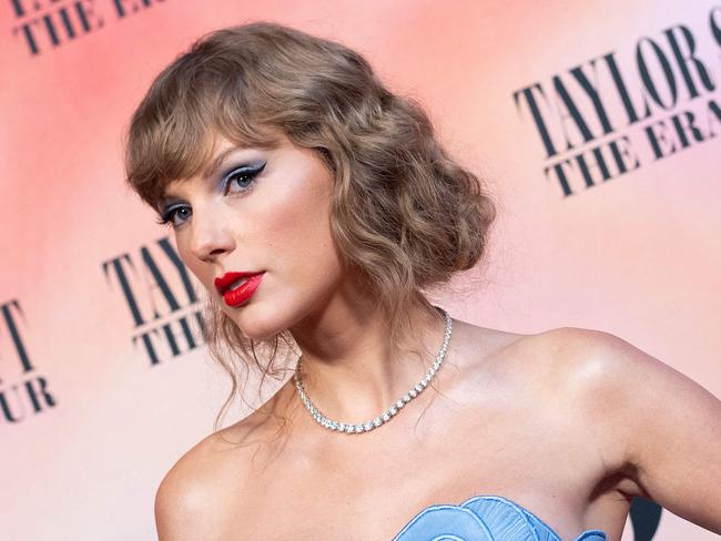 TOPSHOT - US singer Taylor Swift arrives for the "Taylor Swift: The Eras Tour" concert movie world premiere at AMC The Grove in Los Angeles, California on October 11, 2023. (Photo by VALERIE MACON / AFP)