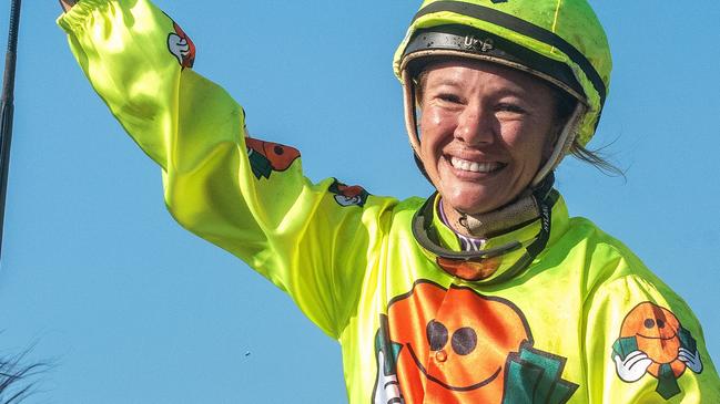 Emotional jockey Sonja Logan wins the Palmerston Sprint on Early Crow, a year after being brutally bashed. Picture: Greg Irvine, Magic Millions.