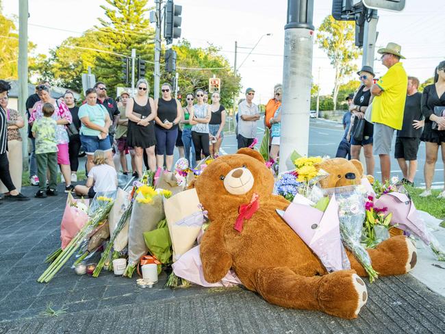 Dozens of people paid their respects to the pair at a candlelight vigil on Wednesday night. Picture: Richard Walker