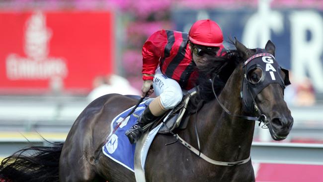 Racing - Victoria Derby Day .Motorola Mackinnin Stakes .Chris Munce rides DESERT WAR to win , trained by GAi Waterhouse Pic;Gregg Porteous