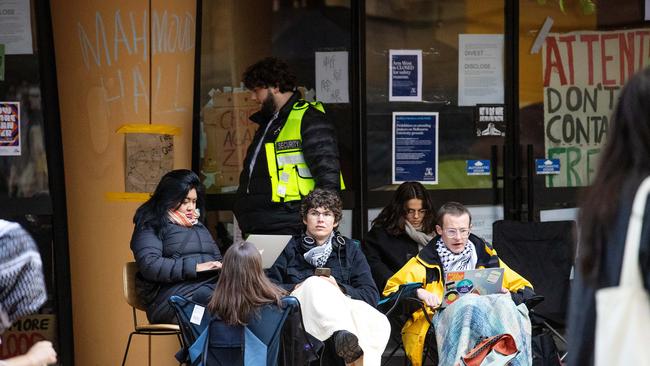 Students and staff at Melbourne University at the Arts West building. Picture: Mark Stewart