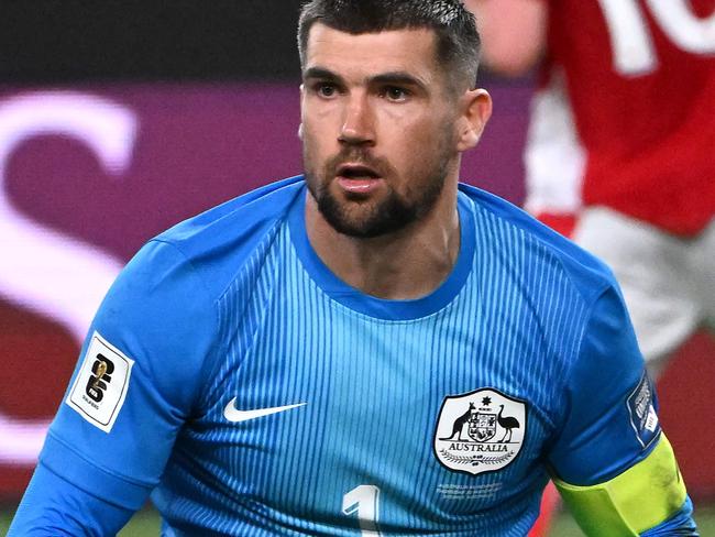 Australia's Mat Ryan clears the ball during the World Cup 2026 Asian qualifier football match between Australia and Indonesia in Sydney on March 20, 2025. (Photo by Saeed KHAN / AFP) / -- IMAGE RESTRICTED TO EDITORIAL USE - STRICTLY NO COMMERCIAL USE --