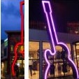 Examples of the proposed 9.2m LED-lit guitar sculpture that would be at the entrance to the proposed Hard Rock Live restaurant and live music venue on The Corso at Manly. Picture: Grain Architects