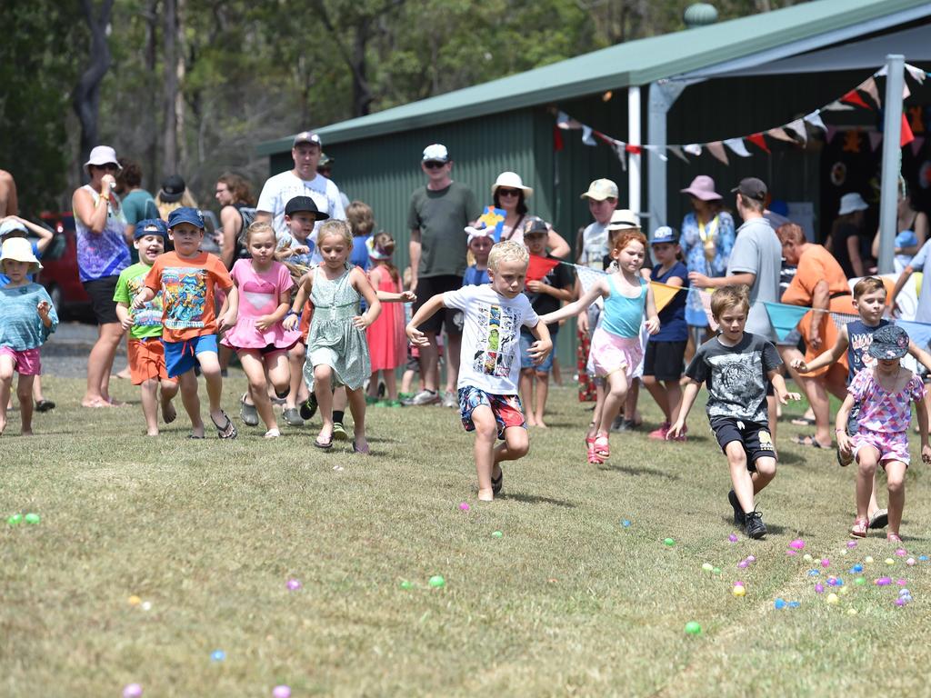 Children making a charge for the Easter eggs. Photo: Alistair Brightman / Fraser Coast Chronicle