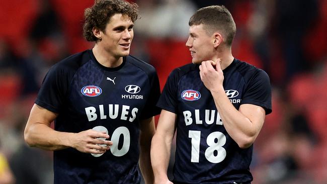 SYDNEY, AUSTRALIA - JULY 06: Charlie Curnow and Sam Walsh of the Blues warm up prior to the round 17 AFL match between Greater Western Sydney Giants and Carlton Blues at ENGIE Stadium, on July 06, 2024, in Sydney, Australia. (Photo by Brendon Thorne/AFL Photos/via Getty Images)