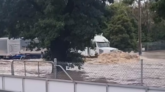 One local business owner shared footage of trucks charging into floodwaters in Heathcote on Facebook. Picture: Supplied / Facebook