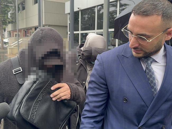 Parents of 15-year-old who allegedly made explicit threats to stab either Jewish or Assyrian people leaving Parramatta Children's Court on Thursday, May 2.