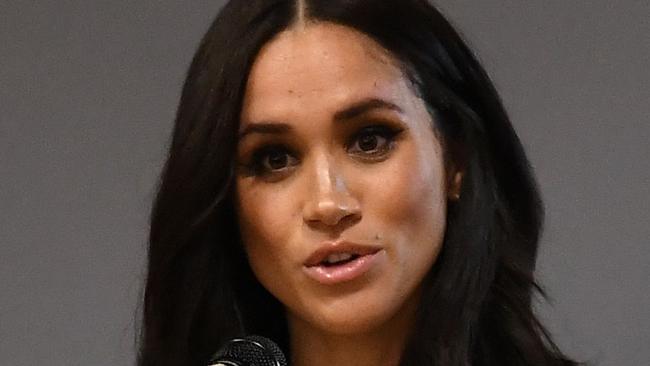 (FILES) In this file photo taken on March 06, 2020 Britain's Meghan, Duchess of Sussex speaks during a school assembly as part of a visit to Robert Clack School in Essex, on March 6, 2020, in support of International Womenâs Day. - Meghan Markle has revealed she suffered a miscarriage in July this year, writing in the New York Times on November 25, 2020 of the deep grief and loss she endured with her husband Prince Harry. (Photo by BEN STANSALL / POOL / AFP) / == STRICTLY EMBARGOED == NO USE AND NO PUBICATION ON ANY PLATFORM UNTIL 22:30 GMT MARCH 7, 2020 ==