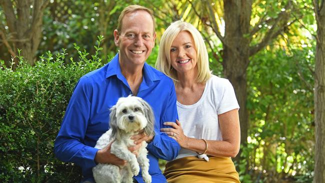 Seven’s Mike Smithson, with wife Fiona and dog Billie at home, says it’s a dream come true to be reading the weekend news bulletin. Picture: Tom Huntley