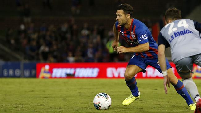 Newcastle marquee Wes Hoolahan looks for support during his A-League debut against Melbourne Victory at McDonald Jones Stadium on Saturday. Picture: AAP