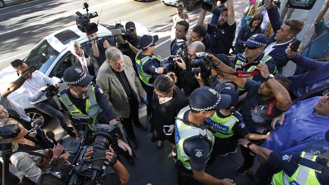 Cardinal George Pell was met with ugly scenes outside court. Picture: David Caird