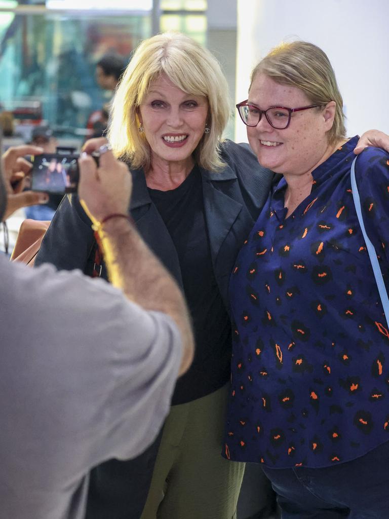 Lumley happily posed with fans in the terminal. Picture: MEDIA-MODE.COM