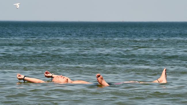 A swimmer cools off at St Kilda. Picture: Nicole Garmston