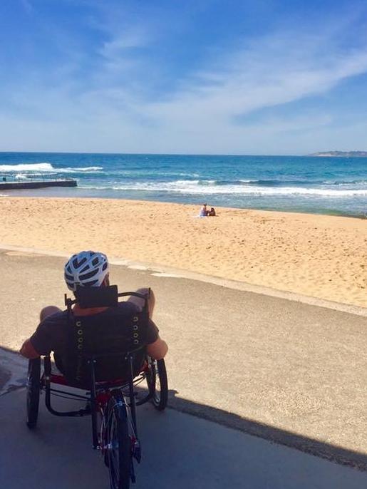 Mr Houghton enjoys the sea breeze while on a family holiday at Collaroy.