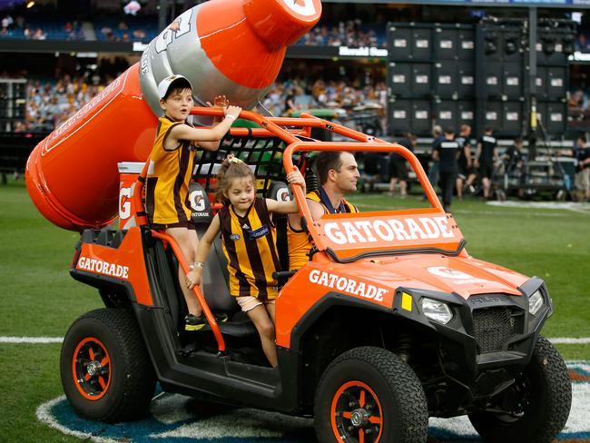 Brian Lake takes his kids for a ride after the Grand Final.