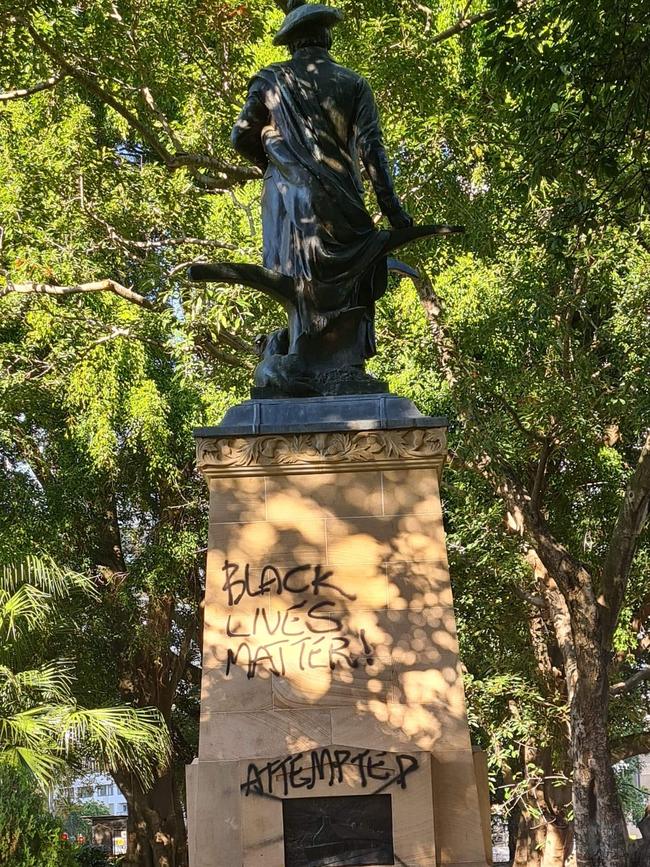 The vandalised statue of Robert Burns in Centenary Place, Fortitude Valley.