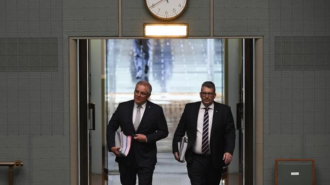 Australian Prime Minister Scott Morrison (left) and Australian Resources Minister Keith Pitt arrive for a fiery Question Time today. Picture: Lukas Coch/AAP