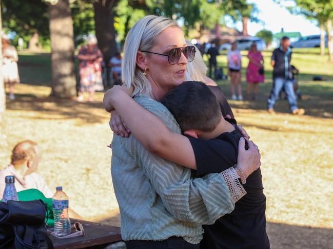 Families held their loved ones close. Picture: Brendan Beckett