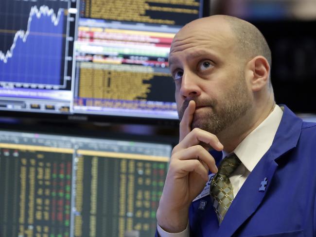 FILE - In this Monday, May 9, 2016, file photo, specialist Meric Greenbaum works on the floor of the New York Stock Exchange. The Dow index, a symbol of investor euphoria and despair for decades, climbed to a new high on Tuesday, July 12, 2016. Itâ€™s been a long time coming, and perhaps a cause for celebration. But the new record high will probably have zero impact on retirement or brokerage accounts. (AP Photo/Richard Drew, File)