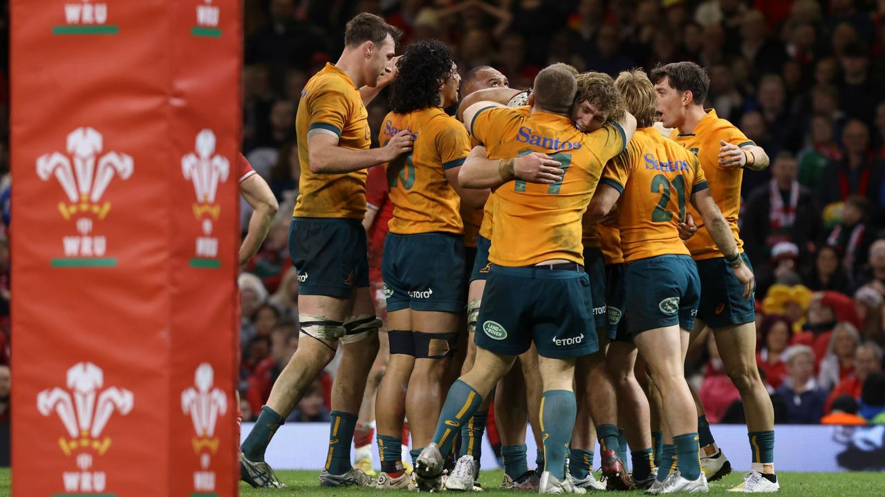 Australia celebrates after winning the Autumn International match. (Photo by Huw Fairclough/Getty Images)