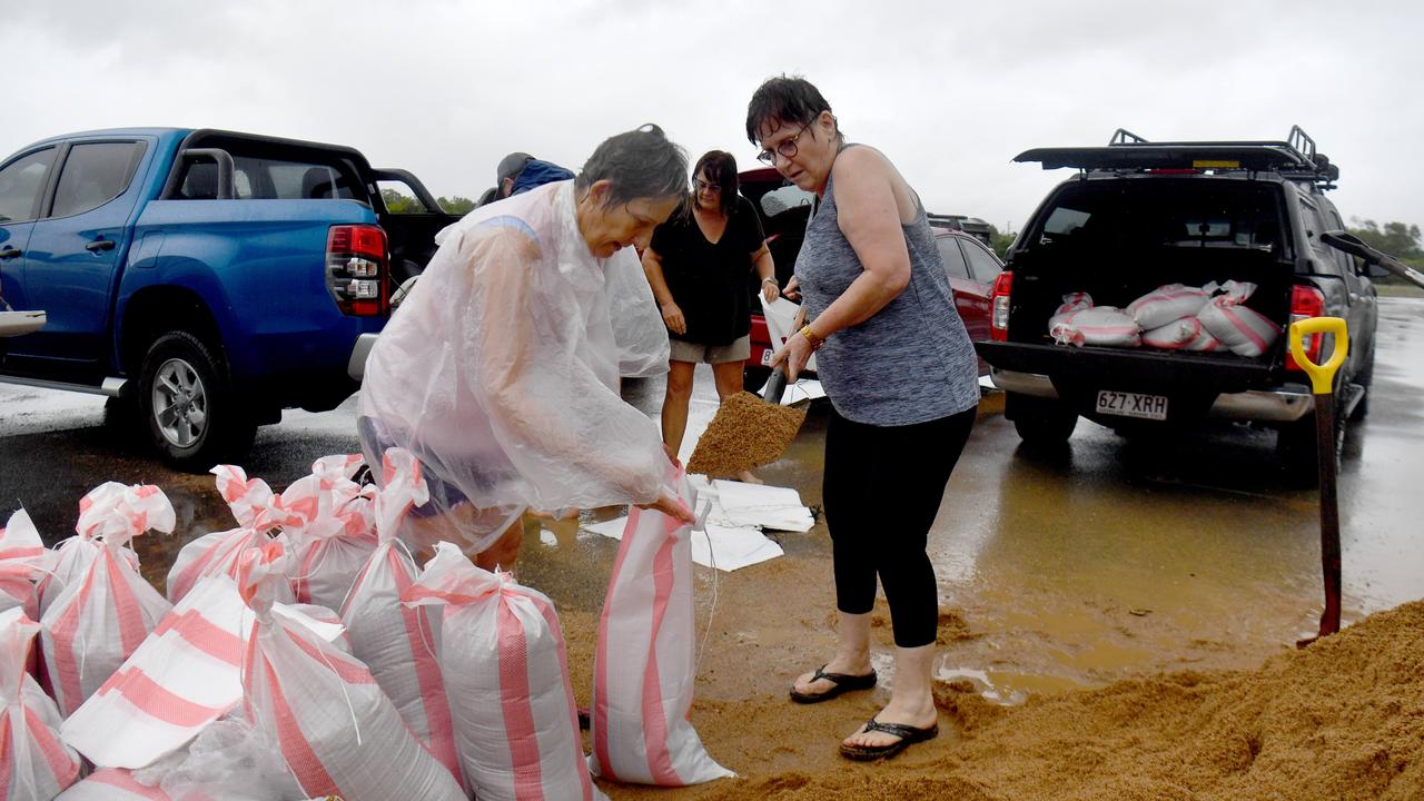 Donna Young and Susan Trowse fill sandbags at Lou Lister Park on Saturday. Picture: Evan Morgan