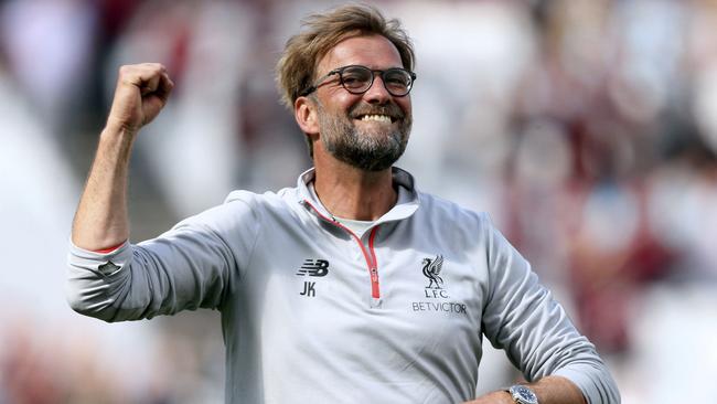 Liverpool manager Jurgen Klopp celebrates after the final whistle and winning 0-4 in the English Premier League soccer match against West Ham United at London Stadium, Sunday May 14, 2017. (Adam Davy/PA via AP)