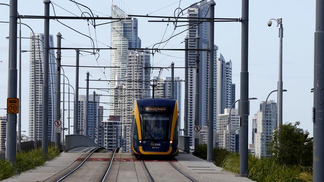 A G:link tram crosses the Sundale bridge from Southport to Surfers Paradise early in the morning. Picture: JERAD WILLIAMS