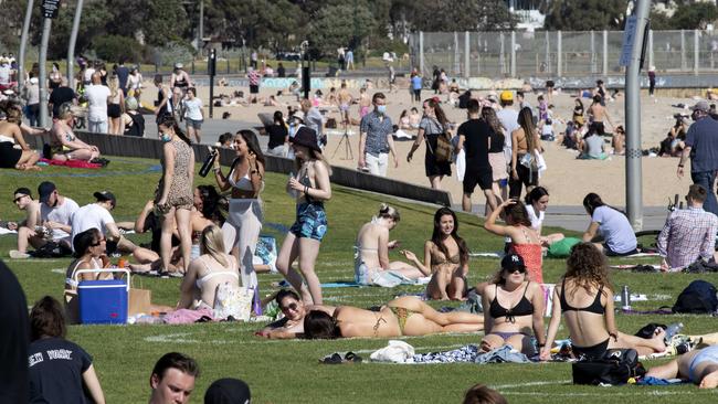 A crowded St Kilda foreshore on Friday afternoon. Picture: David Geraghty