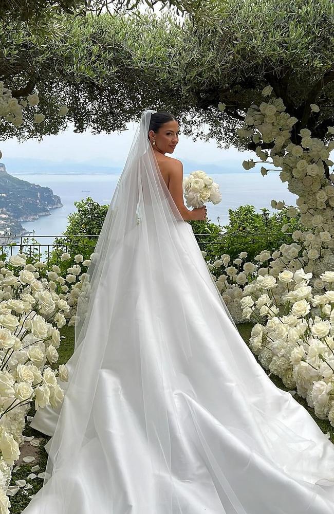 White roses surrounded the bride and groom on the big day. Picture: Instagram