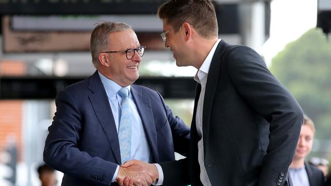 Anthony Albanese shakes hands with Labor candidate for Bennelong, Jerome Laxale, hours before announcing he has Covid. Picture: Toby Zerna