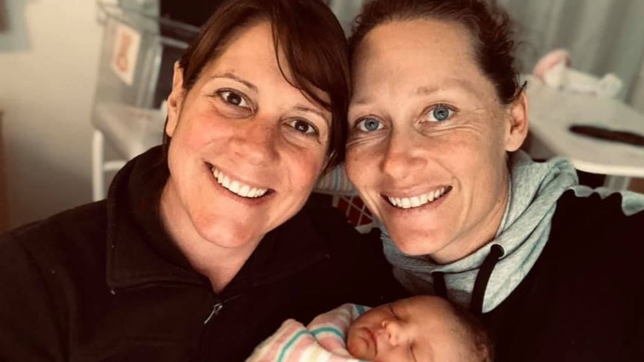 Sam Stosur with her partner and baby daughter.