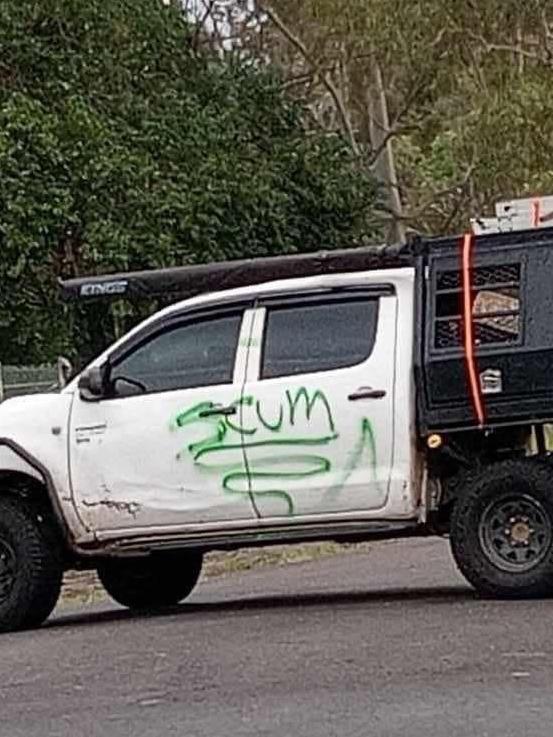 A squatter’s ute, parked across the road to block access to Pine St, was vandalised in the days after Cyclone Alfred. Picture: Facebook
