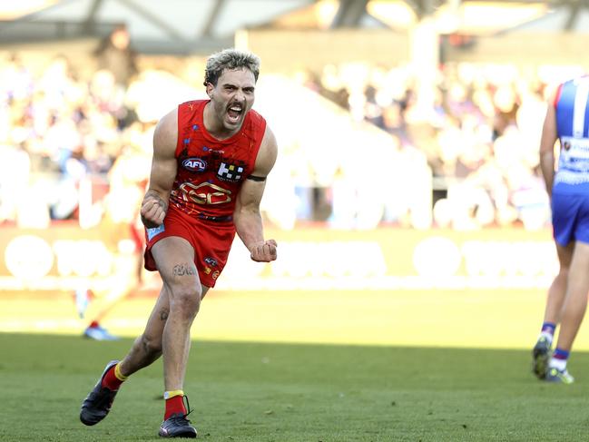 Izak Rankine celebrates a goal against the Western Bulldogs in round 10. Picture: Martin Keep/Getty Images.