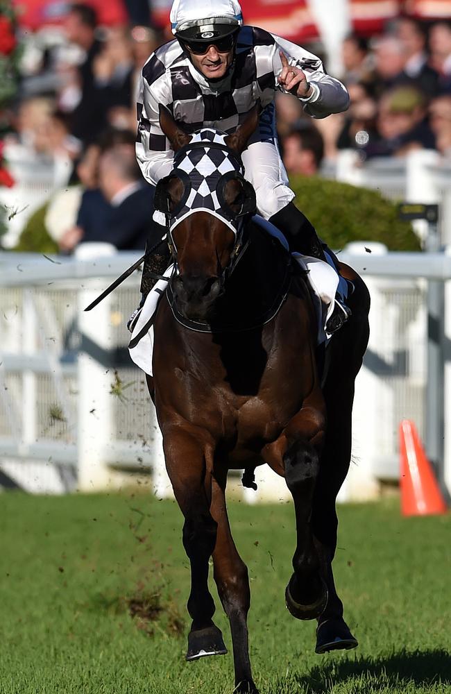 Jockey Damian Brown and Miss Cover Girl skirted the outside fence in order to find the better going before winning the Tattersall's Club Tiara. Picture: AAP