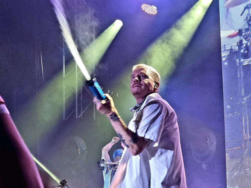 Macklemore sprays the crowd with a super soaker. Picture: Danica Clayton