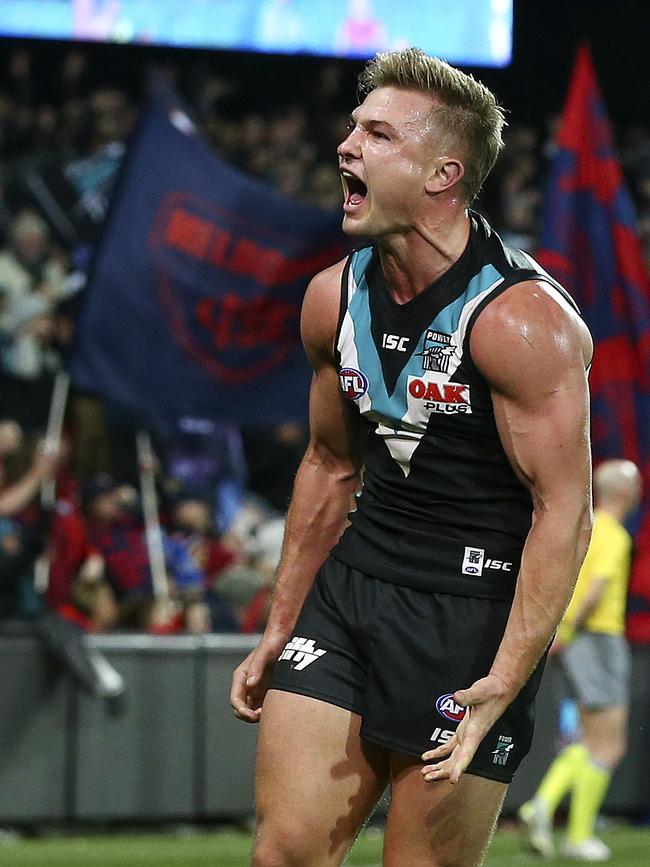 Power’s Ollie Wines celebrates the last goal and the win. Picture SARAH REED