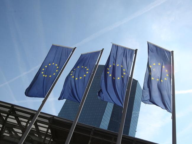 The EU flags are seen in front of the European Central Bank (ECB) in Frankfurt/Main, Germany, on September 8, 2016. The European Central Bank held its record-low interest rates unchanged Thursday, a spokesman said, as analysts expected the bank to wait for a clearer picture to emerge of the Brexit impact before making any drastic policy changes. / AFP PHOTO / DANIEL ROLAND