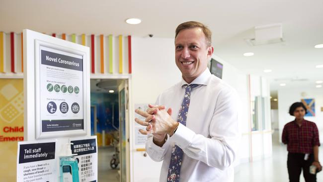 Health Minister Steven Miles using hand sanitiser at Fever Clinic at The Prince Charles Hospital, Rode Rd, Chermside, Brisbane, 6th of March 2020. (AAP Image/Attila Csaszar)