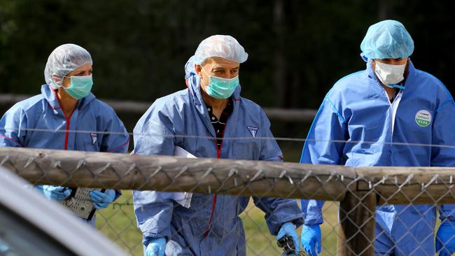 Forensic police at a property at Buccan in the wake of Larissa Beilby’s death. Picture: David Clark/AAP