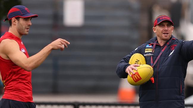 MELBOURNE, AUSTRALIA - APRIL 10: Simon Goodwin, Senior Coach of the Demons reacts during a Melbourne Demons AFL training session at Gosch's Paddock on April 10, 2024 in Melbourne, Australia. (Photo by Robert Cianflone/Getty Images)